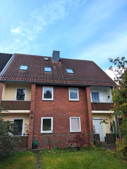 Rückansicht - Wohnung kaufen in Kronshagen - Kapitalanleger aufgepasst! Vermietete Eigentumswohnung mit Balkon in Kronshagen