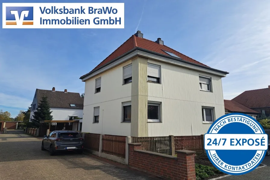 Außenansicht - Haus kaufen in Braunschweig - Doppeltes Glück für Sie – Zweifamilienhaus in Bienrode