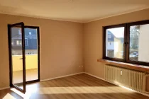 Wohnzimmer mit Balkonausgang