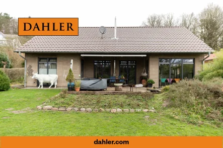 Ebenerdiges Wohnen mit sehr guter Energieklasse - Haus kaufen in Bendestorf - Barrierefreies Wohnen: Neuwertiger Bungalow mit Satteldacheindeckung in Ortskernlage von Bendestorf