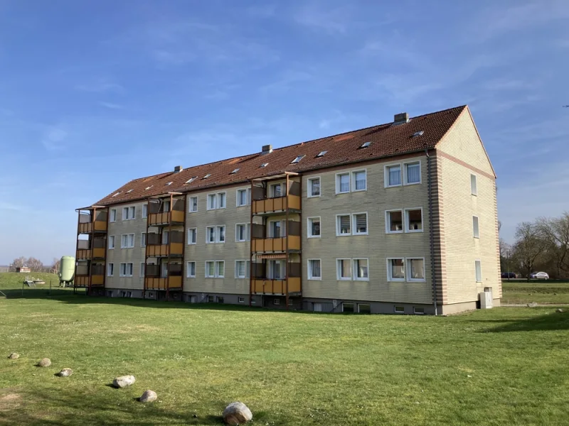 Außenansicht - Wohnung kaufen in Warnow - Bezugsfreie Eigentumswohnung in ruhiger Lage