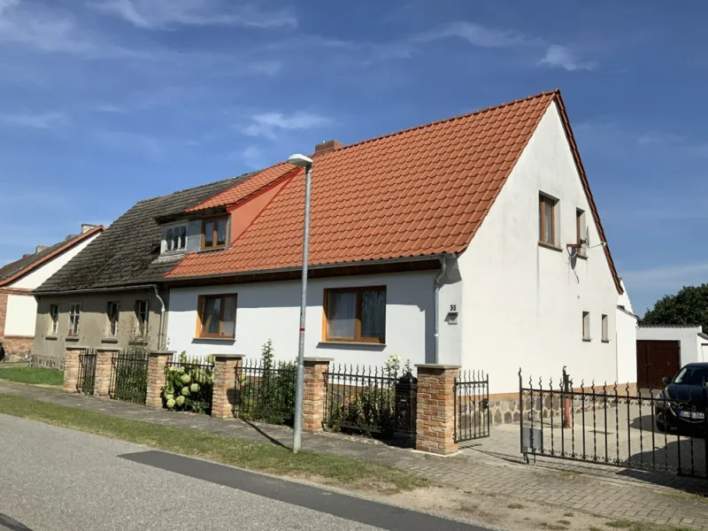 Hausansicht straßenseitig - Haus kaufen in Liepen / Steinmocker - Bezaubernde Doppelhaushälfte in ruhiger Lage