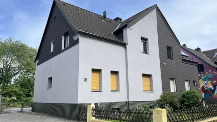 Außenfoto - Haus kaufen in Essen / Gerschede - Charmantes Zweifamilienhaus mit Großem Garten in Essen/Gerschede