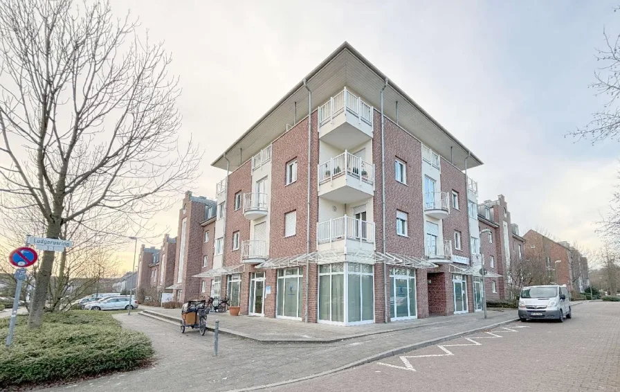  - Wohnung kaufen in Neuss -  mit Mietsteigerungspotenzial! 2 Wohnungen, 11 Carports und 2 TG-Stellplätze in Neuss-Holzheim