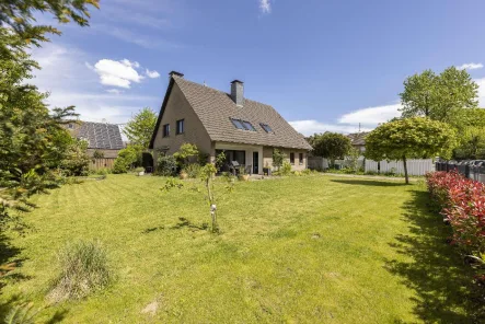  - Haus kaufen in Dormagen - Saniertes Einfamilienhaus mit Garage auf großem Grundstück in ruhiger Lage von Dormagen-Straberg