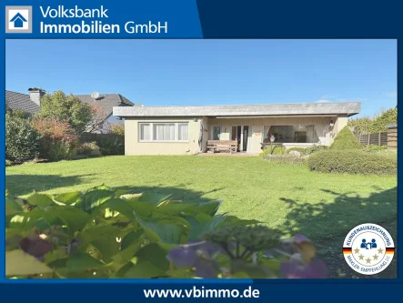 Rückansicht - Haus kaufen in Brüggen - Bungalow in guter Lage von Brüggen mit Renovierungsbedarf