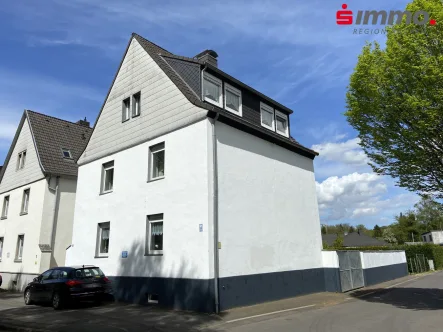 Titelbild - Haus kaufen in Stolberg - 2-Familienhaus mit Garage und großem Garten
