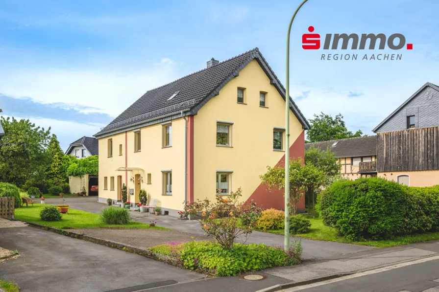 Titelbild - Haus kaufen in Roetgen - Wohnidylle mit traumhaftem Grundstück in zentraler Roetgener Wohnlage