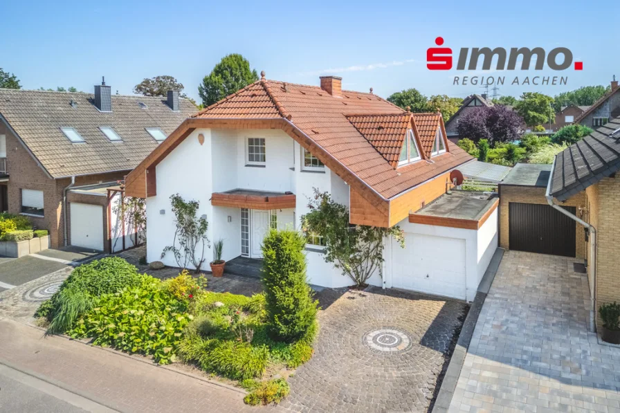 Titelbild - Haus kaufen in Baesweiler - Freistehendes Einfamilienhaus in bevorzugter Wohnlage