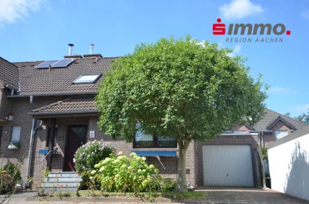 Titelbild - Haus kaufen in Herzogenrath - Bezugsfreies Einfamilienhaus mit Garage in ruhiger Spielstraße