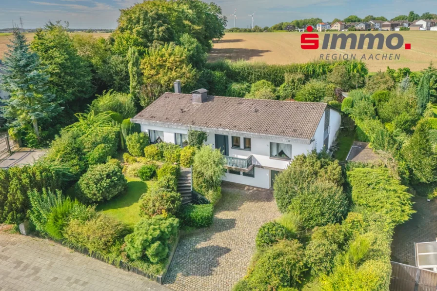 Titelbild mit Logo - Haus kaufen in Alsdorf - Ihre Wohnoase mit nicht einsehbarem Garten