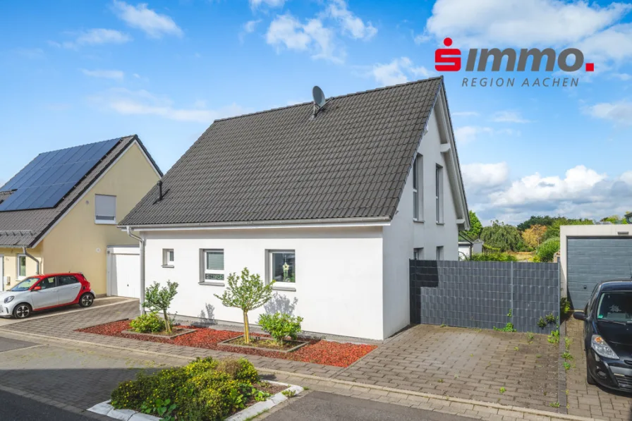 Titelbild - Haus kaufen in Roetgen - Freistehendes Einfamilienhaus mit schönem Garten in beliebter Wohnlage