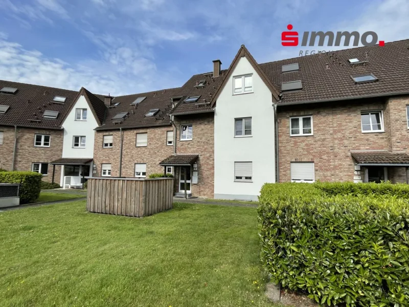 Frontansicht - Wohnung kaufen in Würselen - Moderne Maisonettewohnung mit Balkon und Tiefgaragenstellplatz in bevorzugter Lage