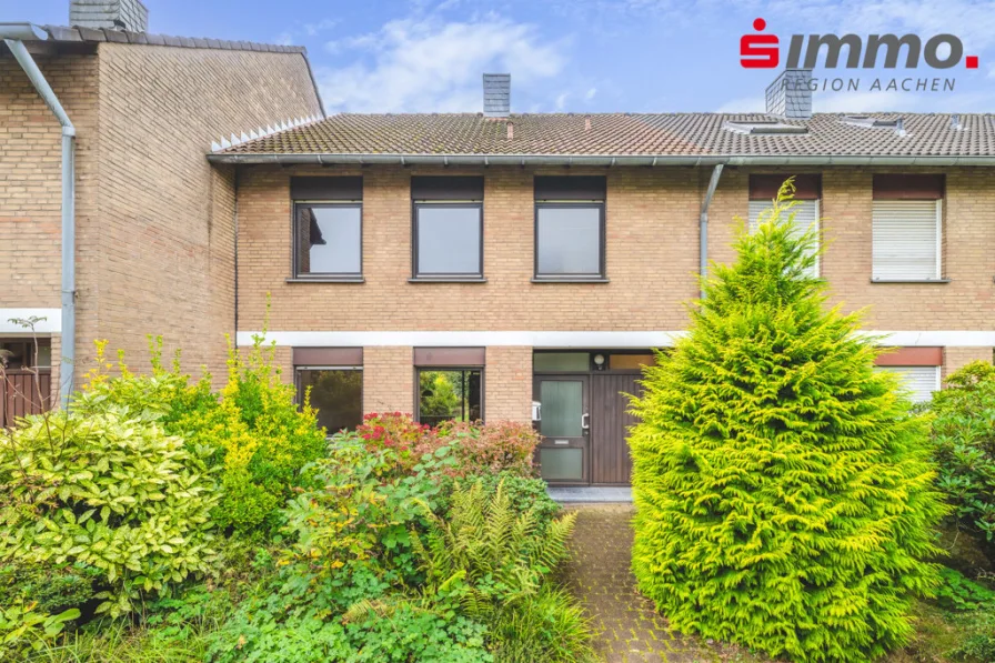 Titelbild - Haus kaufen in Meerbusch - Gepflegtes Reiheneinfamilienhaus mit sonnigem Garten in ruhiger Lage