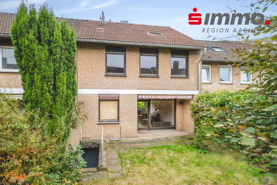 Titelbild - Haus kaufen in Meerbusch - Gepflegtes Reiheneinfamilienhaus mit sonnigem Garten in ruhiger Lage