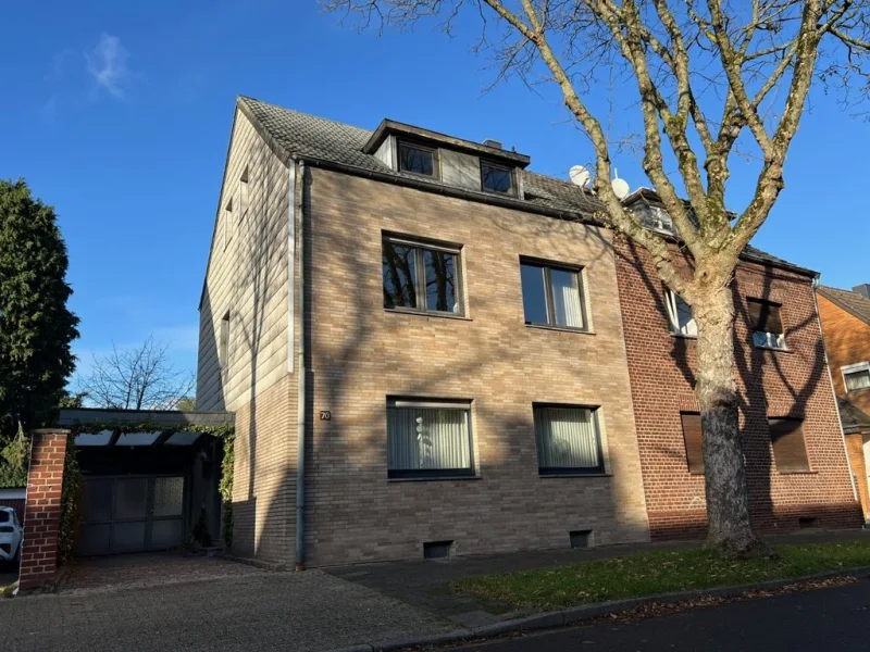 Titelbild - Haus kaufen in Baesweiler - Bezugsfreies Einfamilienhaus mit Garage im Stadtzentrum