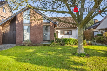 Titelbild mit Logo - Haus kaufen in Herzogenrath - Freistehendes Einfamilienhaus mit Garage in Erbpacht