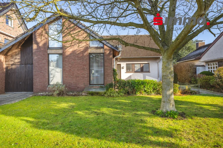 Titelbild mit Logo - Haus kaufen in Herzogenrath - Freistehendes Einfamilienhaus mit Garage in Erbpacht