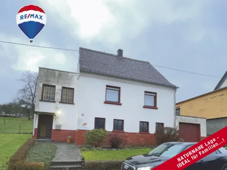 Vorderansicht - Haus kaufen in Marpingen - TIER- und GARTENFREUNDEaufgepasst: Einfamilienhaus mit GROSSEM Grundstück in RUHIGER Lage...!