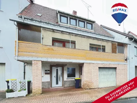 Vorderansicht - Haus kaufen in Namborn - Renovierungsbedürftiges Reihenmittelhaus in RUHIGER Lage mit GARAGE + kleinem GARTEN...!