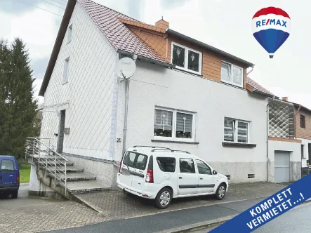 Linke Giebelansicht - Haus kaufen in Eppelborn - Solide KAPITALANLAGE mit 3 Wohneinheiten in ruhiger Seitenstraße mit schönem Garten + Garage....!