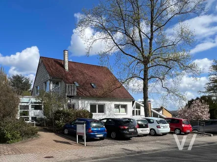Perspektive - Haus kaufen in Saarbrücken - Gepflegtes Wohn-/Geschäftshaus mit ausreichend Parkmöglichkeiten in Ensheim