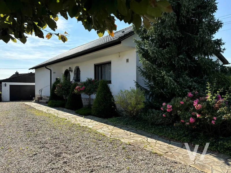 Ansicht_E_1_WZ - Haus kaufen in Saarbrücken - Stilvolles Einfamilienhaus mit großem Garten und Doppelgarage in Panoramalage von Eschringen