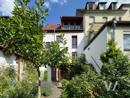 Rückansicht - Haus kaufen in Saarbrücken - Charmantes Reihenhaus mit idyllischem Garten in Saarbrücken - Jägersfreude