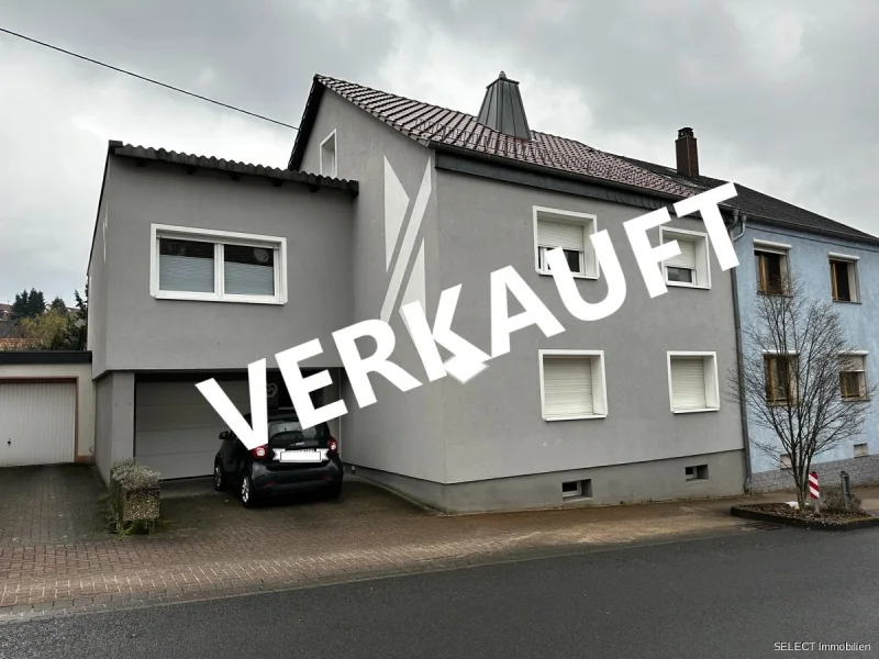 VERKAUFT - Haus kaufen in Spiesen-Elversberg - Ein- Zweifamilienhaus mit Garten und Garage