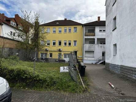 Ansicht - Haus kaufen in Neunkirchen/Saar - Anlageobjekt - Wohnhaus mit vier Wohneinheiten in Zentraler Lage