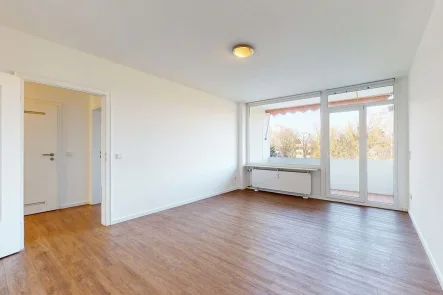 Beispiel Foto Wohnzimmer - Wohnung kaufen in Düsseldorf - Für Kapitalanleger: Vermietete 3-Zimmerwohnung mit Loggia im begehrten Kaiserswerth