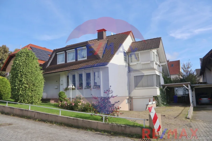  - Haus kaufen in Borchen - Geräumiges Ein-/Zweifamilienhaus in familienfreundlicher Umgebung