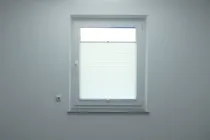 Plissees an allen Fenstern