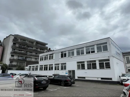 Bild1 - Sonstige Immobilie kaufen in Leverkusen - Eigennutz und/oder Kapitalanlage!:Betriebsgebäude mit Büro, 3 Wohnungen und Ladenlokalen