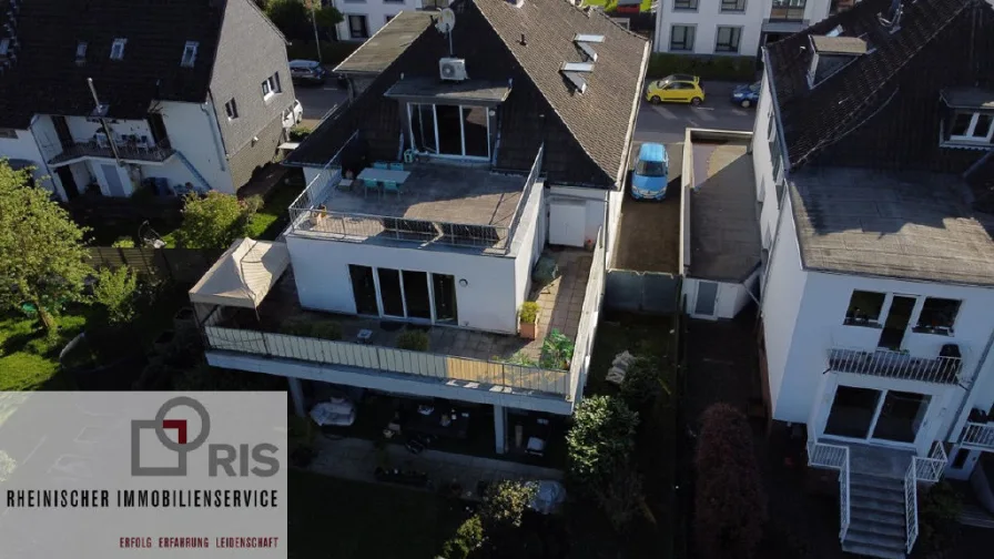 Bild1 - Wohnung kaufen in Leverkusen - Schicke Wohnung mit toller Rundumdachterrasse und Blick ins Grüne