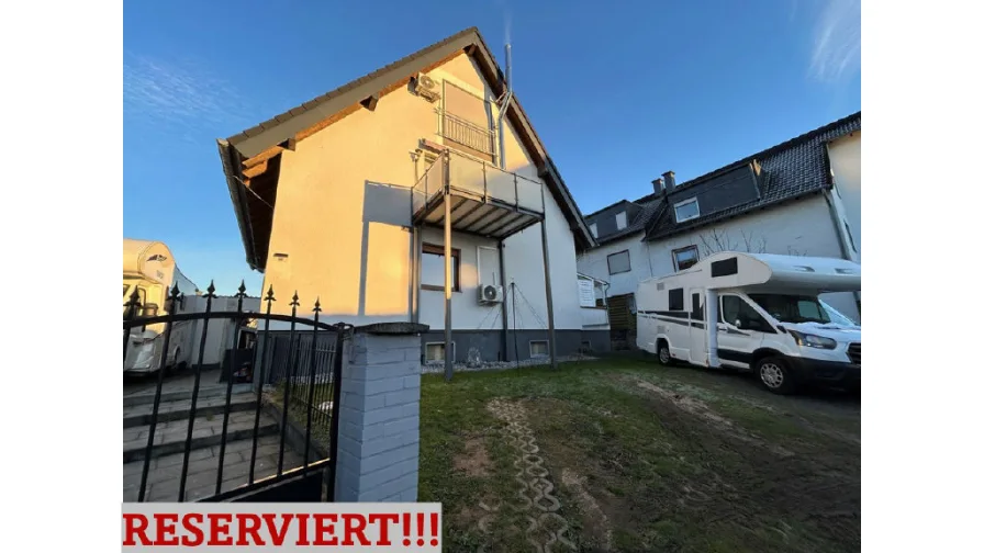 Bild1 - Wohnung kaufen in Leverkusen-Lützenkirchen - Perfekt für die kleine Familie! Gartenwohnung in schöner Wohngegend!