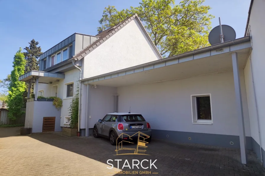 Titelbild - Haus kaufen in Köln - Dellbrück - Kernsaniertes Einfamilienhaus auf traumhaftem Südgrundstück mit altem Baumbestand.