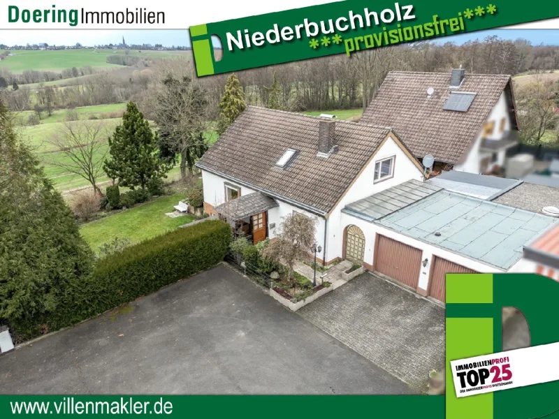 Außenansicht - Haus kaufen in Königswinter - Familienidylle in Niederbuchholz: Wohnkomfort mit Garten und XXL-Garage