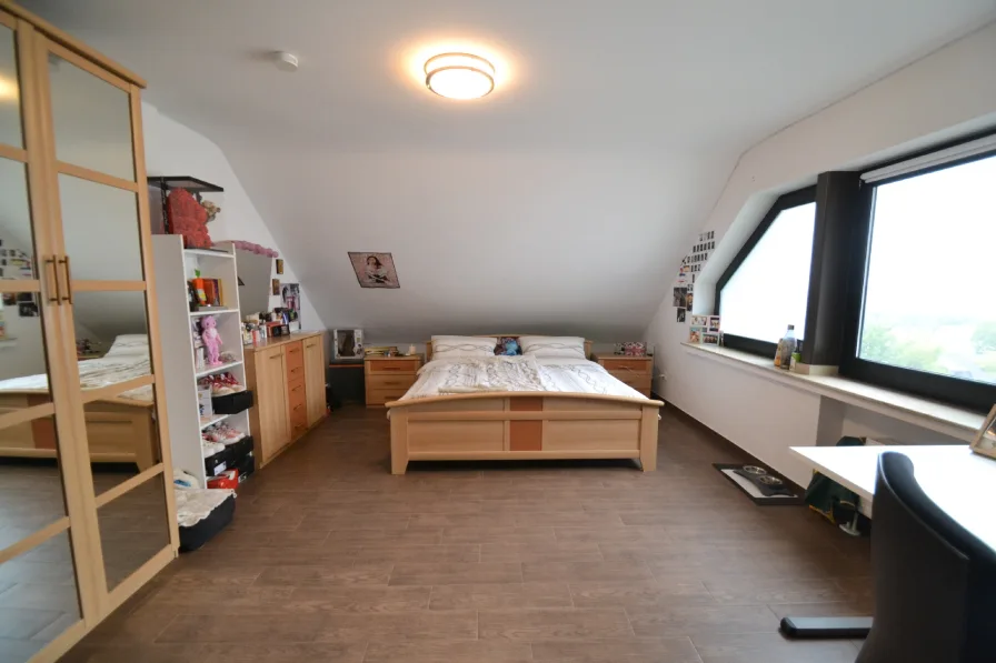 Teilansicht weiteres Zimmer Wohnung OG