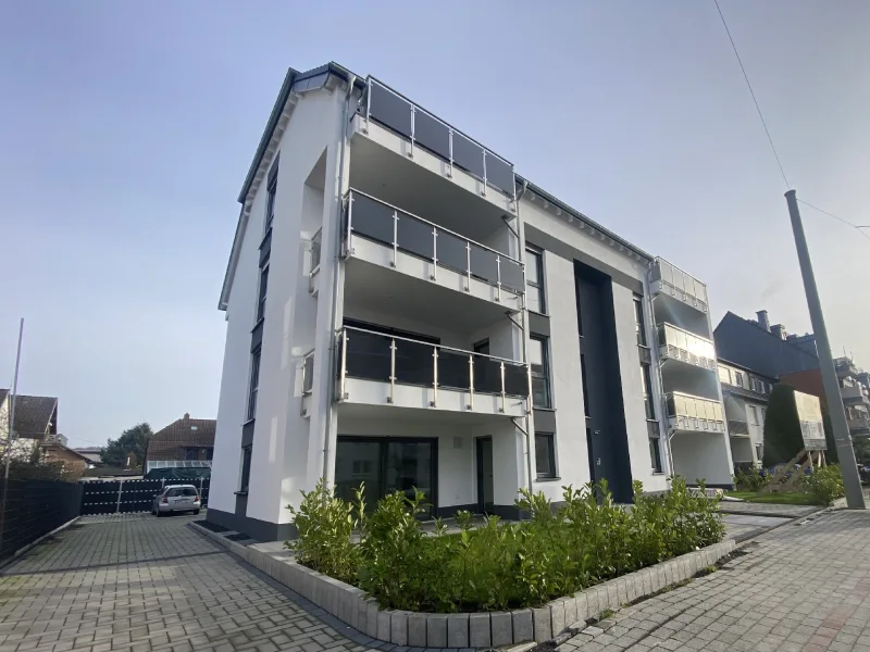 Frontansicht - Wohnung kaufen in Troisdorf - Nachhaltiges Wohnerlebnis in zentraler Lage: Barrierefreie Eigentumswohnung mit Aufzug und Balkon