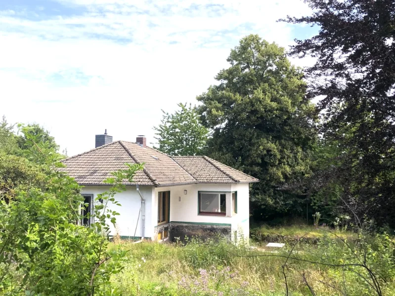 Außenansicht - Haus kaufen in Sprockhövel - Renovierungsbedürftiger Bungalow auf großem Grundstück in Sprockhövel