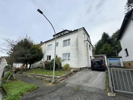 Außenansicht - Haus kaufen in Gevelsberg - Kapitalanlage in ruhiger Waldrandlage in Gevelsberg: Mehrfamilienhaus mit drei vermieteten Wohnungen