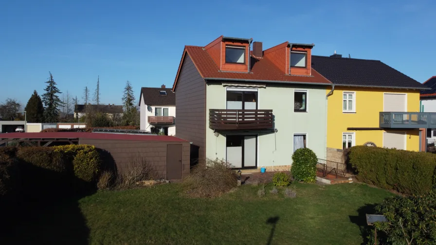 Rückanischt - Haus kaufen in Riegelsberg - Gepflegte Doppelhaushälfte in Top-Lage von Riegelsberg