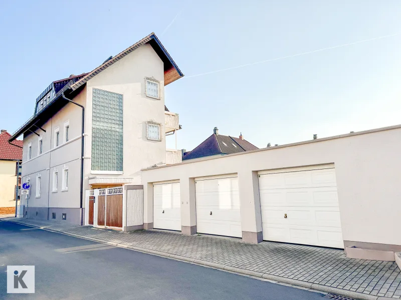 Vorderansicht - Haus kaufen in Viernheim - Raumwunder mit 3 modernen Bäder wartet auf Sie!