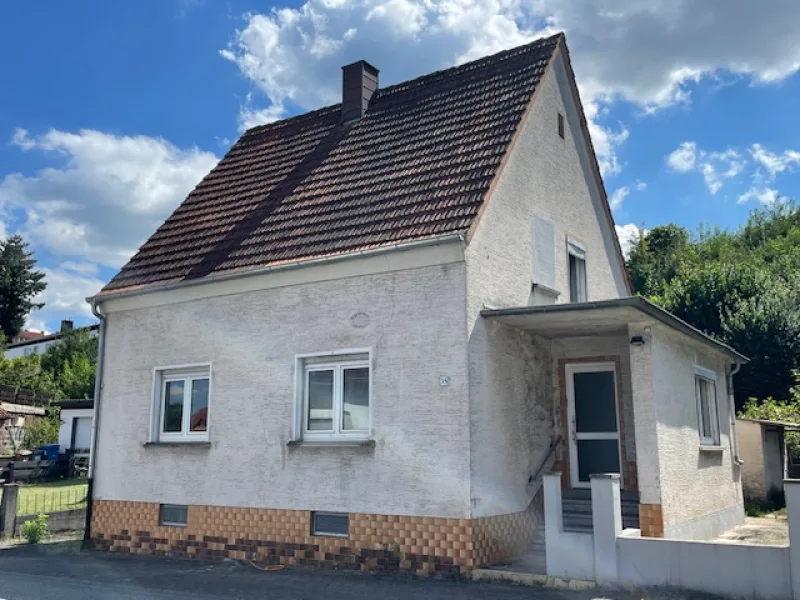  - Haus kaufen in Weilerbach - Einfamilienhaus mit Potenzial: Ideal für Renovierungsprojekte 