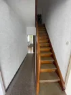 Flur mit Treppe zum DG