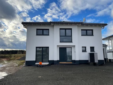 Ihr neues Zuhause - Haus kaufen in Bruchmühlbach-Miesau - Neuwertiges Einfamilienhaus mit großem Grundstück in sonniger Lage und traumhaftem Fernblick 