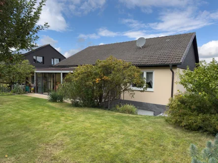 Rückansicht - Haus kaufen in Unna - Unna-Hemmerde Bungalow mit Keller und Garage