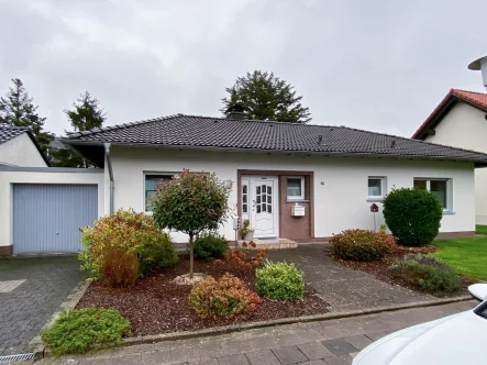 Vorderansicht - Haus mieten in Unna - Vollunterkellerter Bungalow in ruhiger Lage