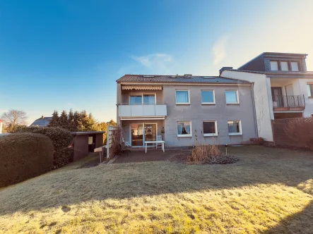 Ansicht hinten - Haus kaufen in Unna - Ein- / Zweifamilienhaus mit Sonnengrundstück Keller und Garage